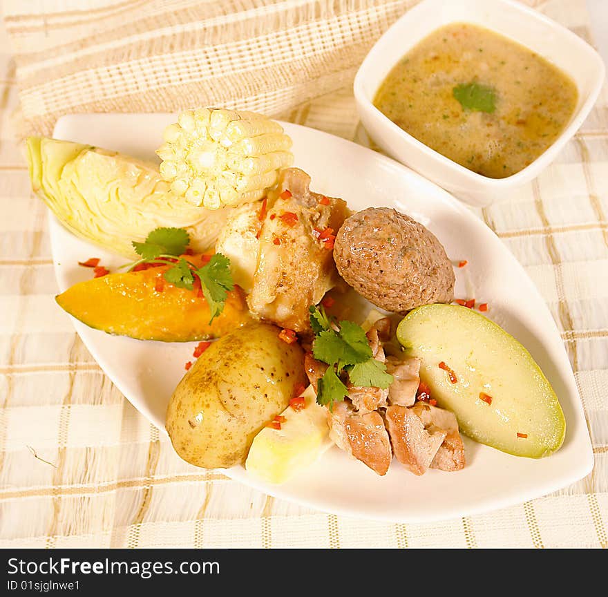 Meat and vegetable soup called in spanish olla de carne