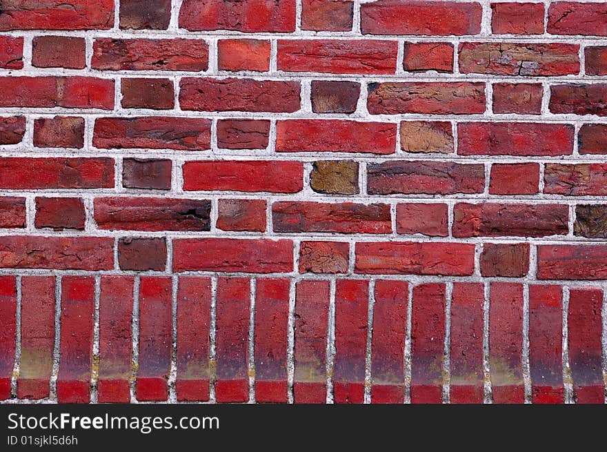 Old obsolete red brick wall. Old obsolete red brick wall