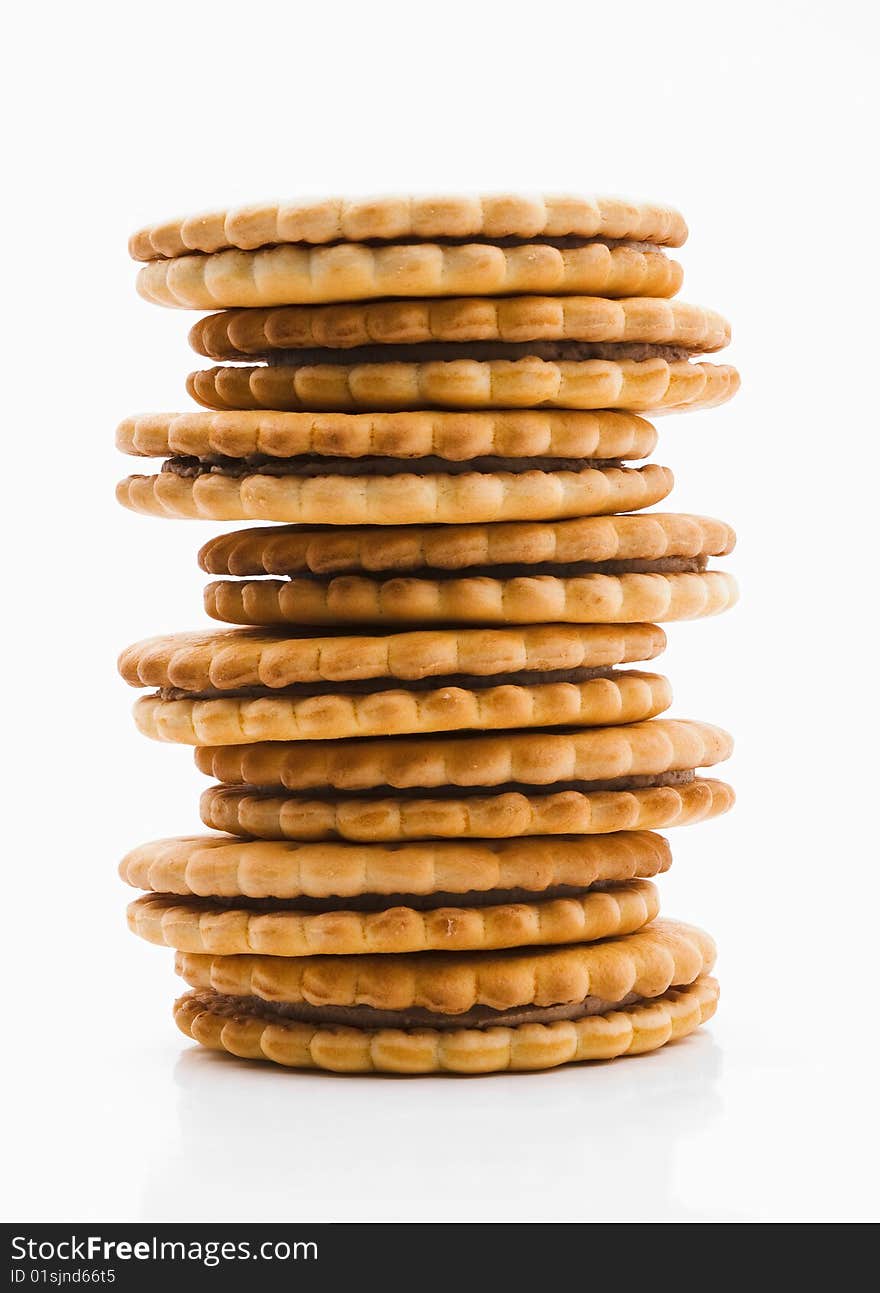 Biscuit in the form of towers, the white background. Biscuit in the form of towers, the white background