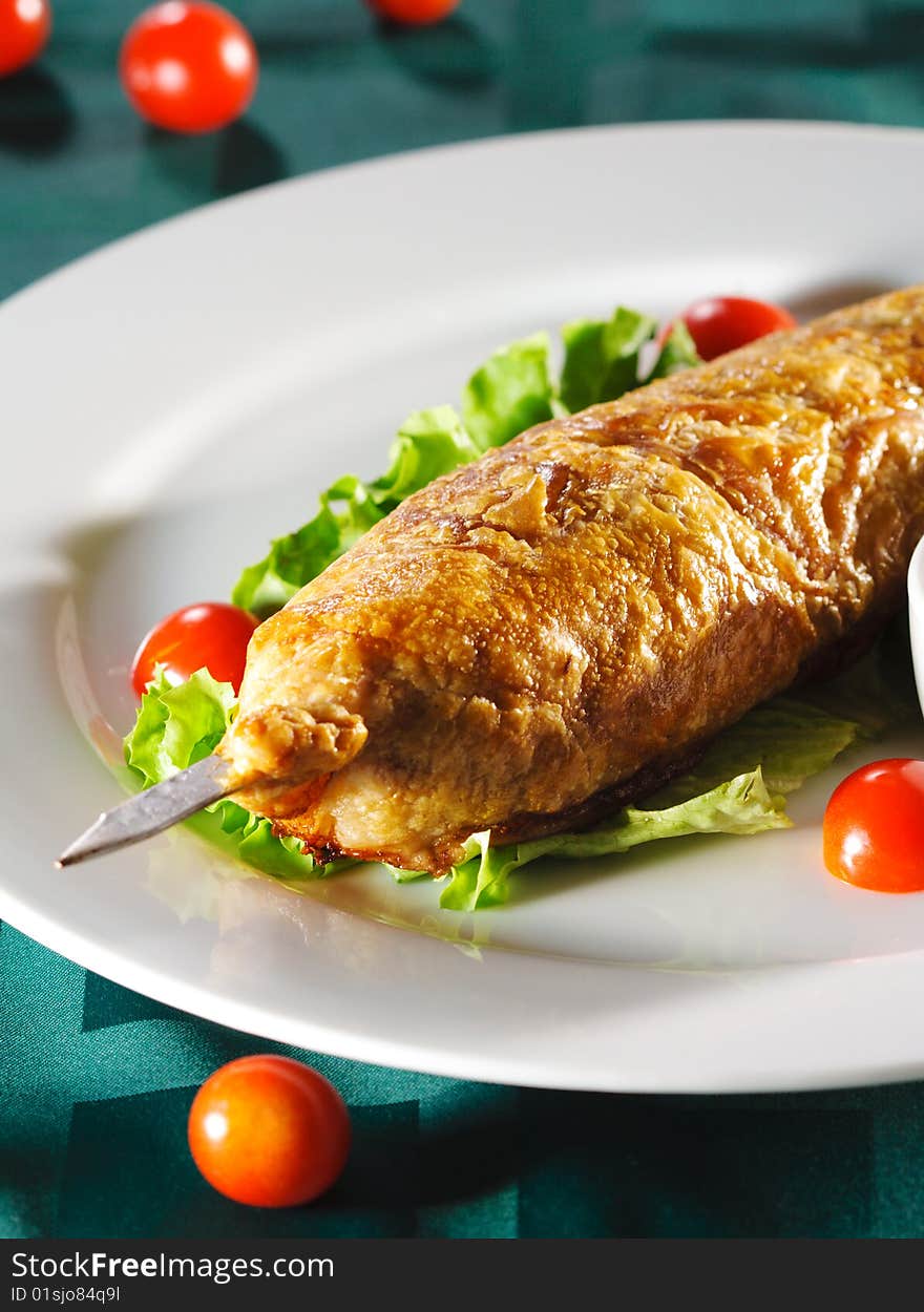 Hot Meat Dishes - Meat in Pastry with Cherry Tomato and Fresh Salad Leaf