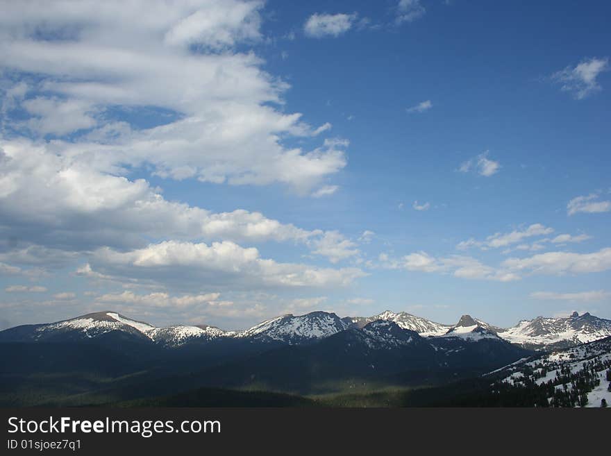 Mountain snow peaks in spring. Mountain snow peaks in spring