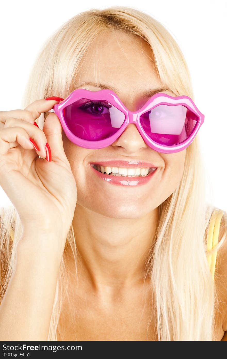 Pretty blonde  woman in yellow bikini and rose sunglasses