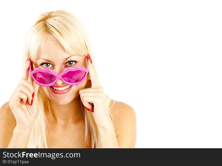 Pretty blonde woman in yellow bikini and rose sunglasses