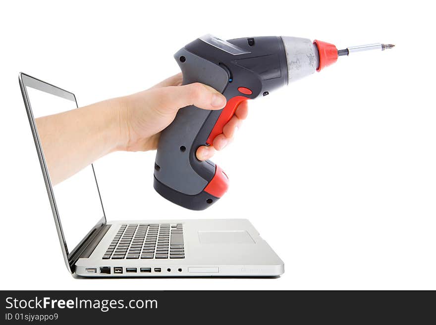 Man's hand with electro screwdriver from the laptop. Man's hand with electro screwdriver from the laptop.