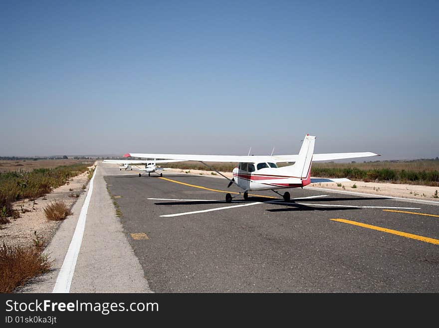 3 airplanes taxing before takeoff. 3 airplanes taxing before takeoff