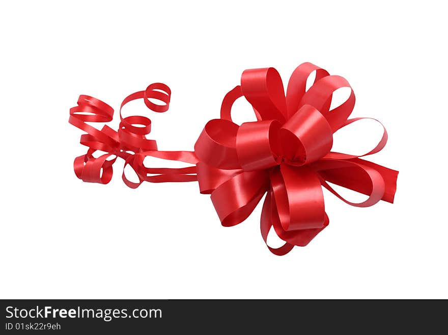 Isolated Shiny Red Bow and Ribbons on a white background. Isolated Shiny Red Bow and Ribbons on a white background.