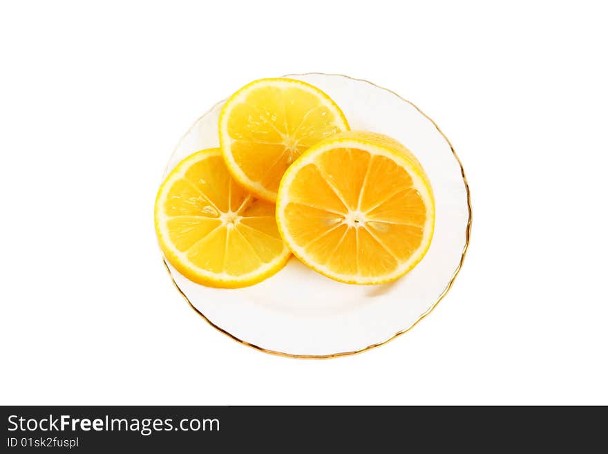 Three slice of orange on a white plate