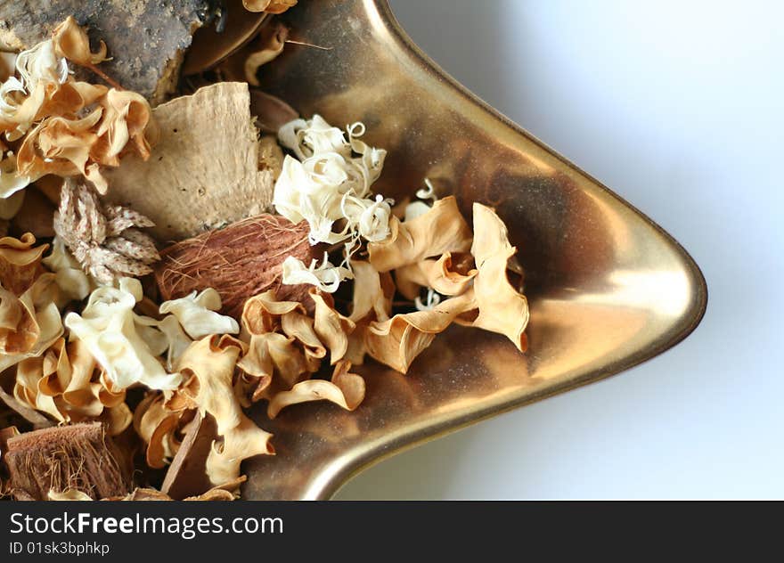 A close-up of a decorative bowl of potpourri.