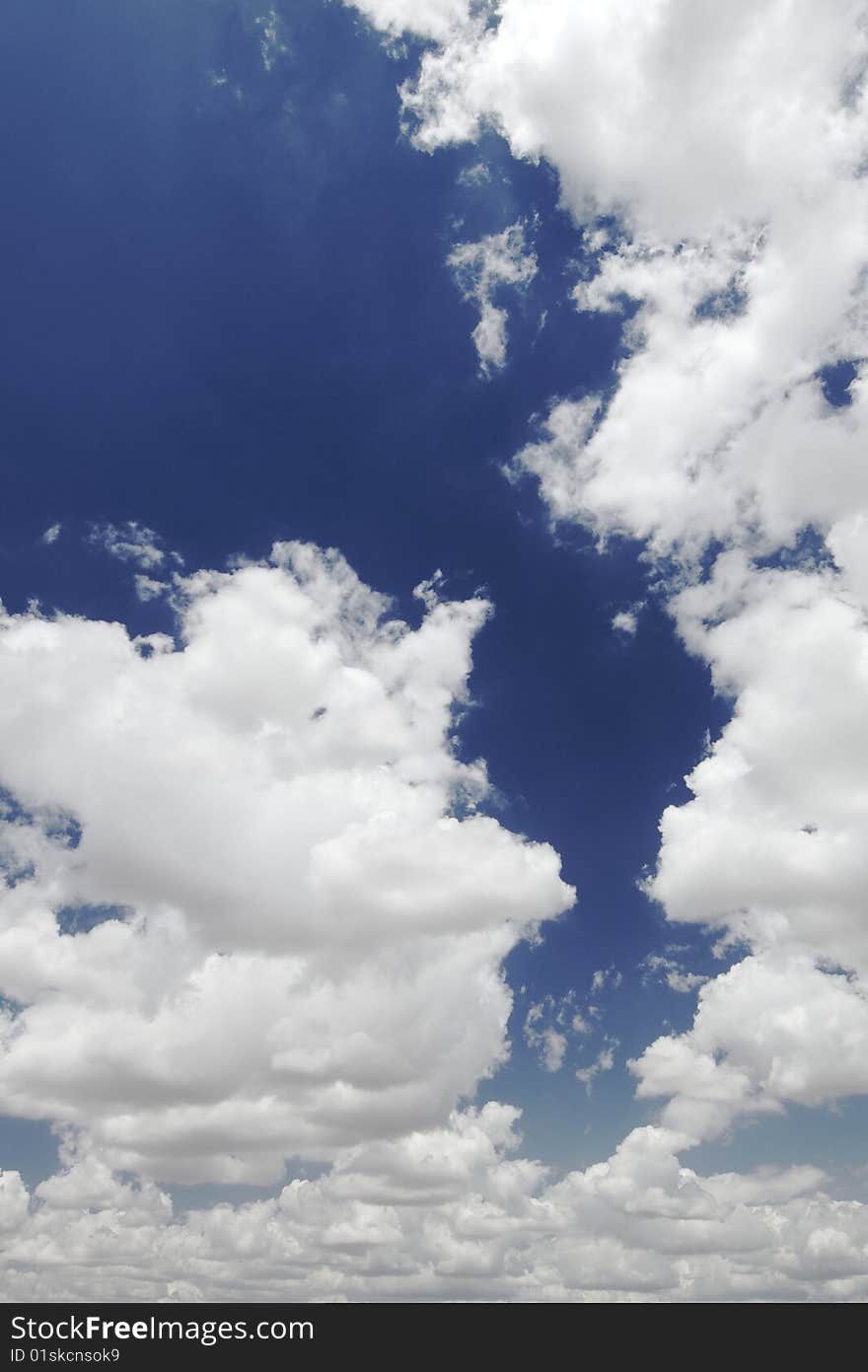 Blue sky and clouds background