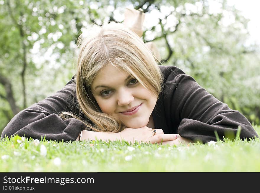 Portrait of a smiling beautiful woman in garden