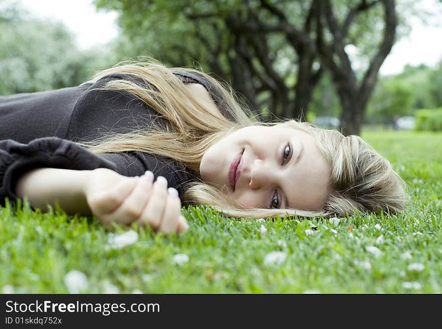 Young woman relaxing in garden