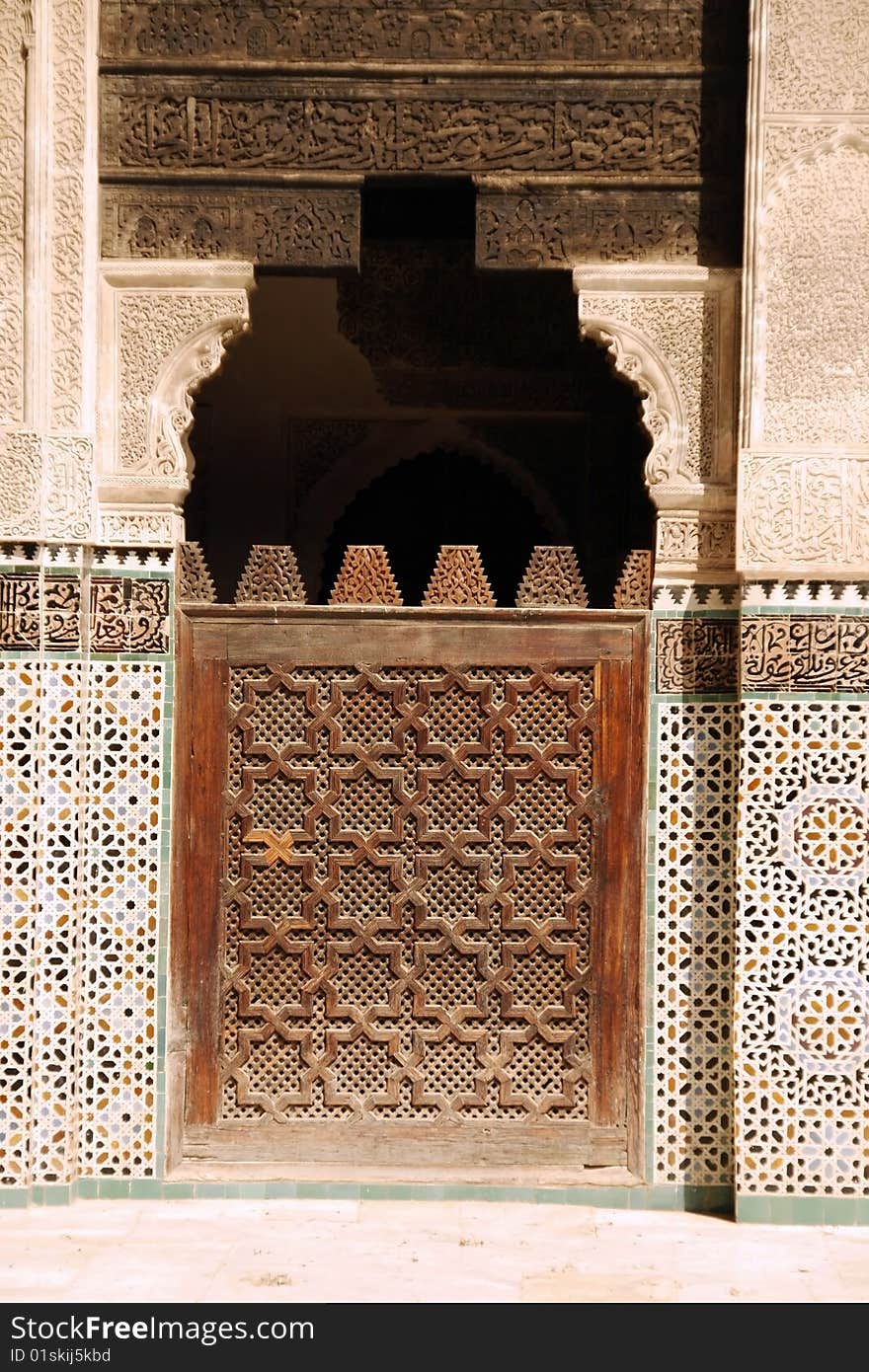 Detail of a wooden door at the Bou Inania Madrassa in Fez, Morocco