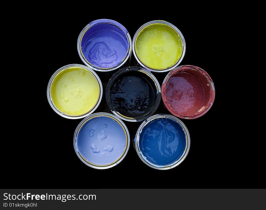 A set of cans color on a black background. A set of cans color on a black background