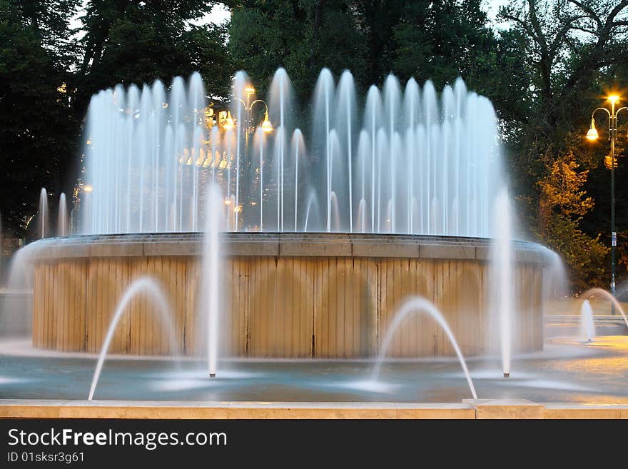 The fountain in front of Castello Sforzesco main entrance, taken at the sunset with a long time exposition: the water seems silk. The fountain in front of Castello Sforzesco main entrance, taken at the sunset with a long time exposition: the water seems silk