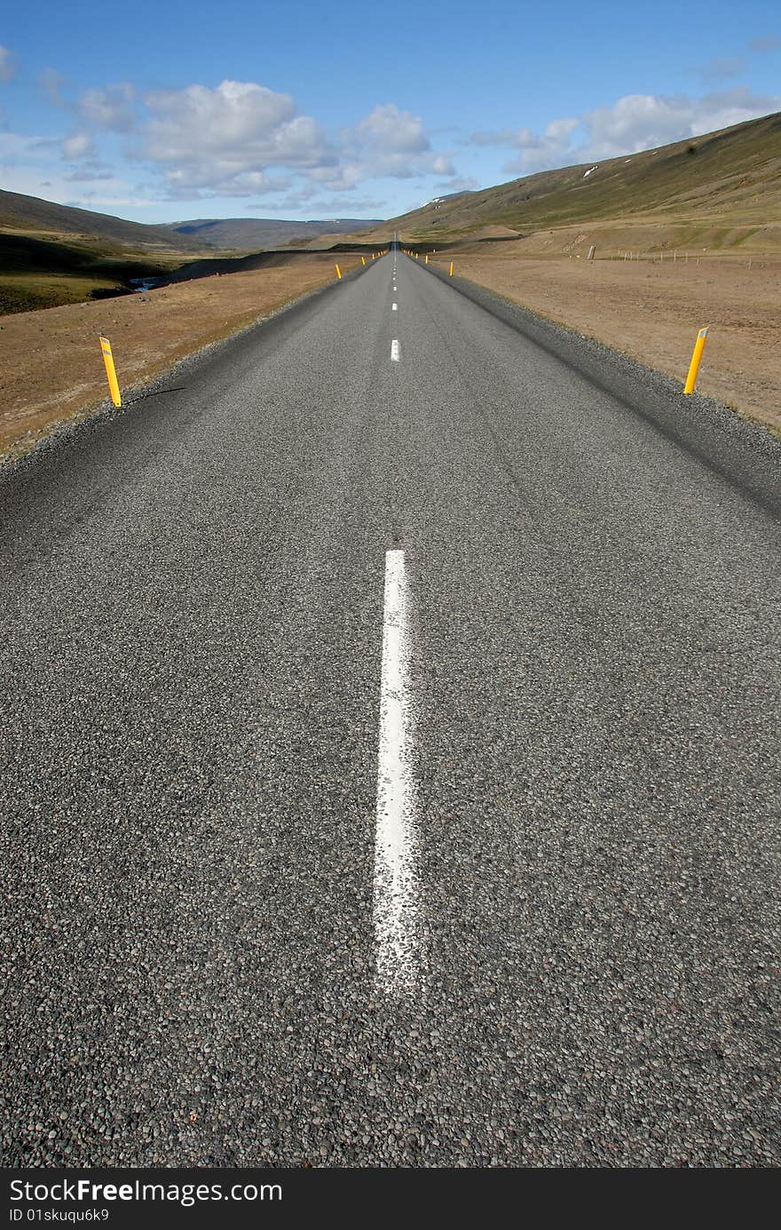 An empty straight road to nowhere