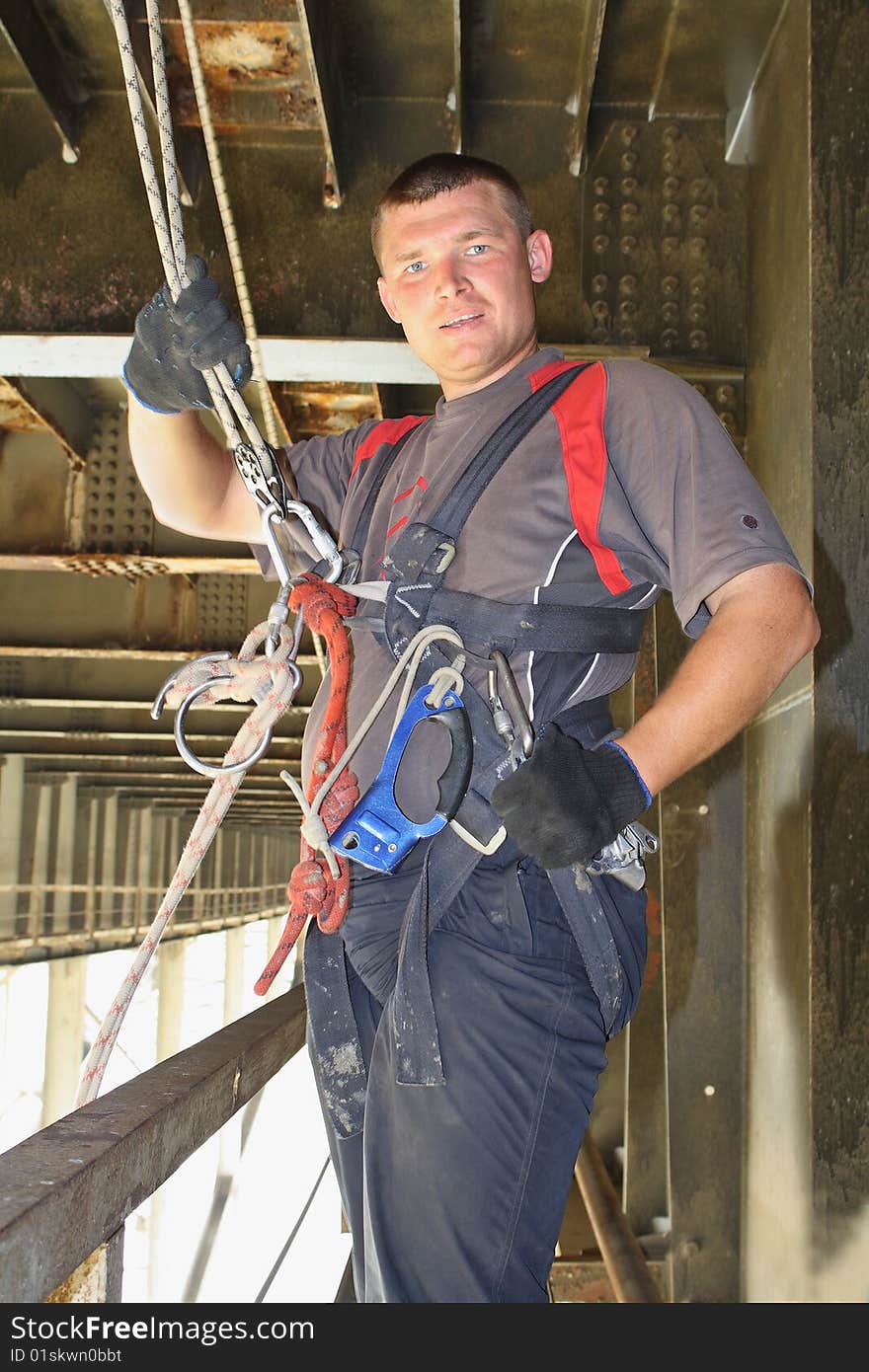 The man the professional climber in city conditions. The man the professional climber in city conditions