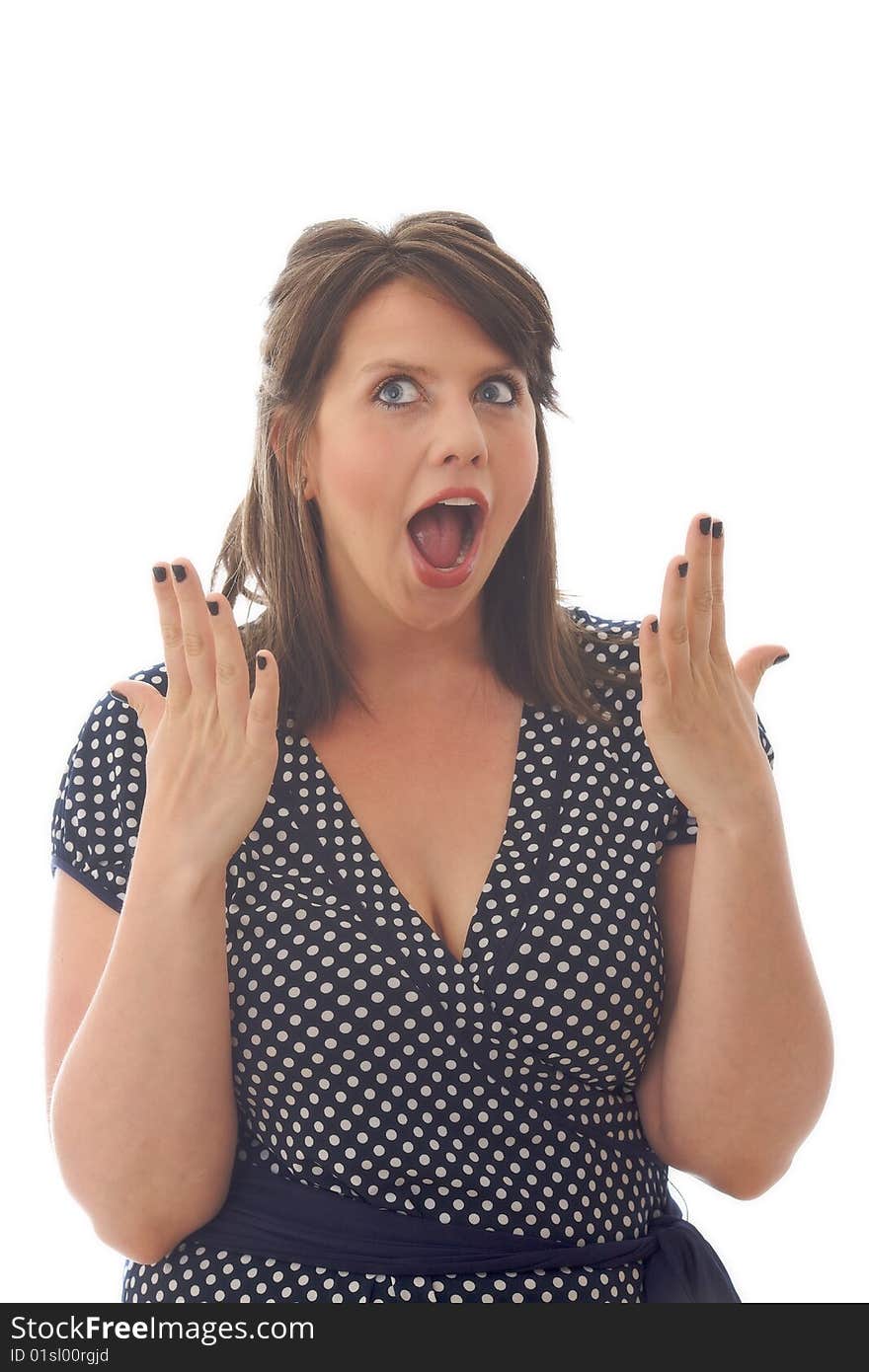 Young woman in dress showing surprise; isolated on white background. Young woman in dress showing surprise; isolated on white background.