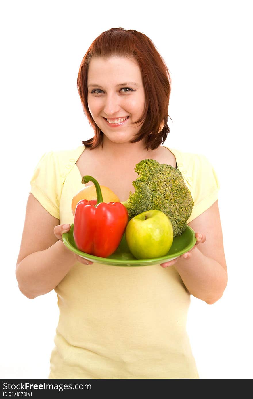 Woman eating vegetables