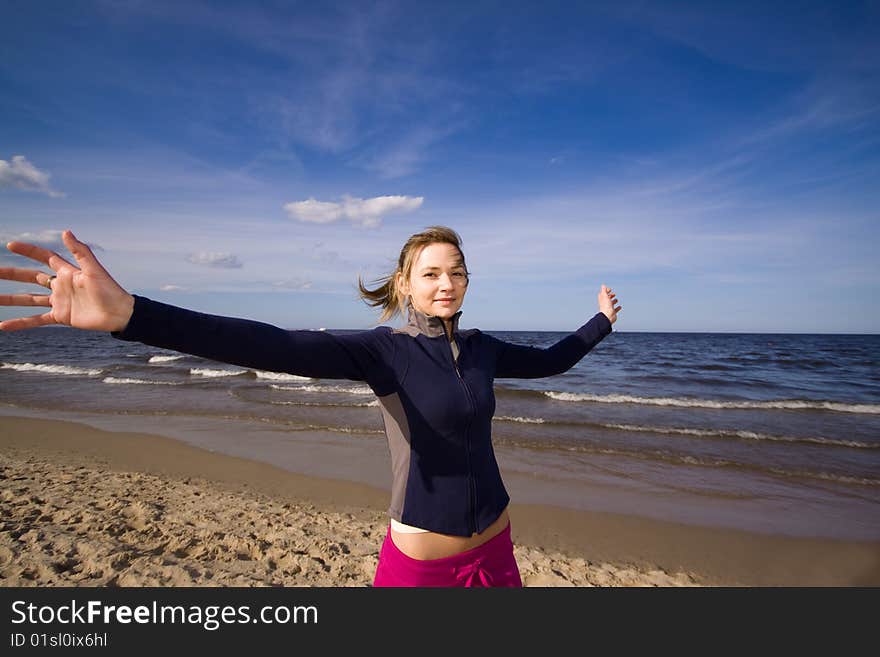 Active woman running on the beach. Active woman running on the beach