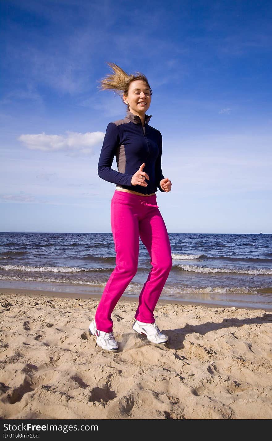 Active woman running on the beach. Active woman running on the beach