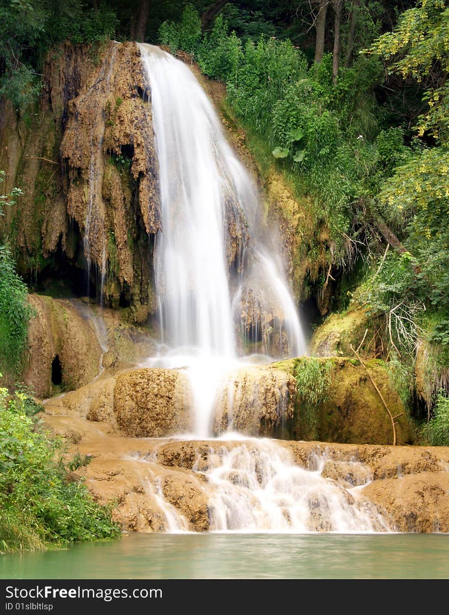 A view of the waterfall in summer.