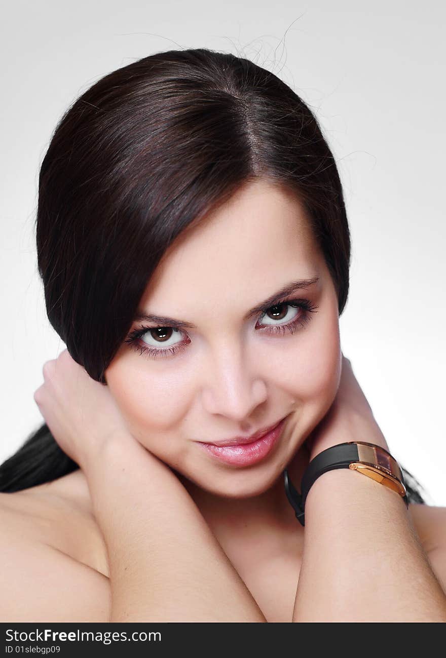 Black hair young woman portrait, studio shot