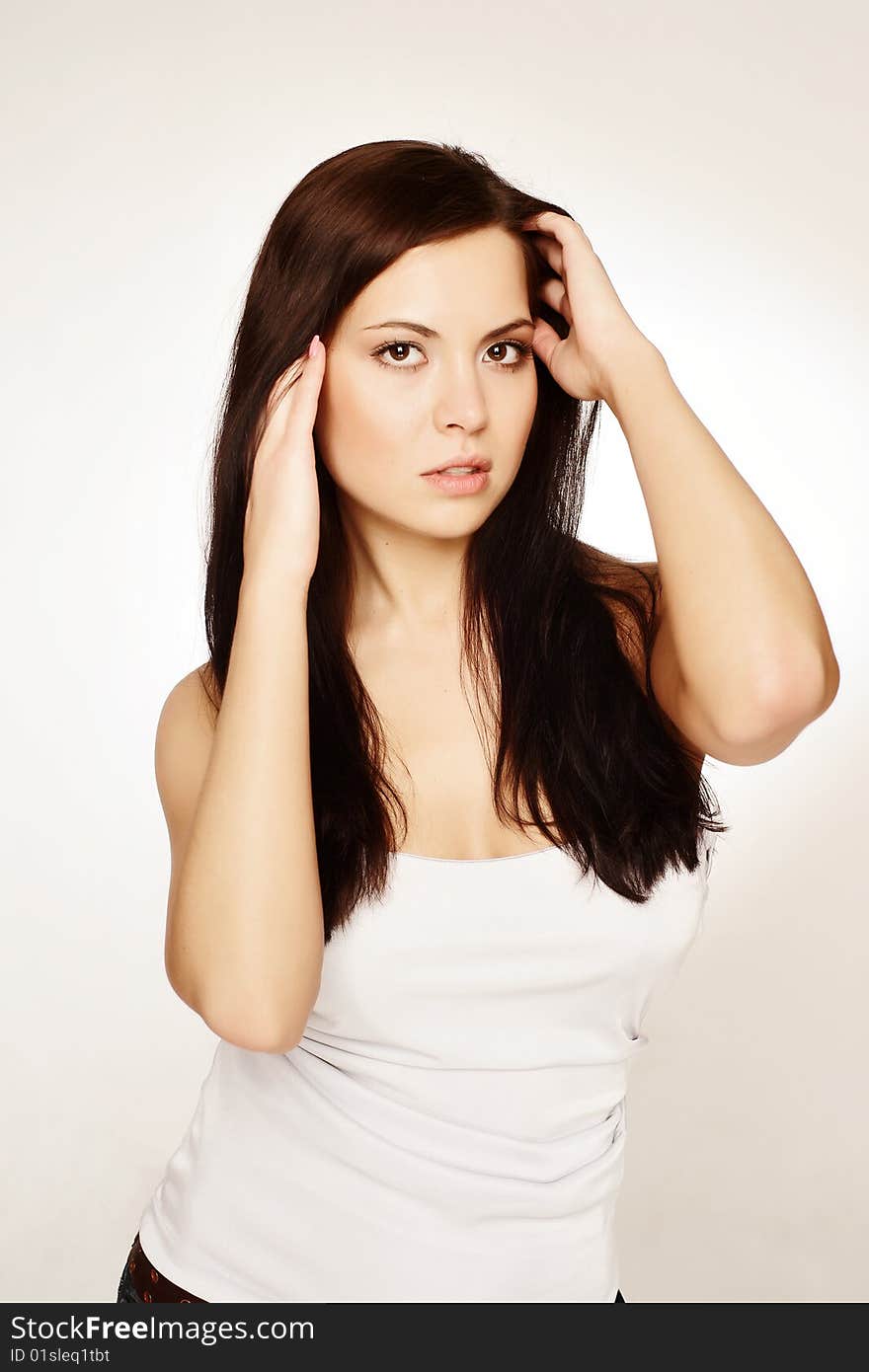 Black hair young woman portrait, studio shot