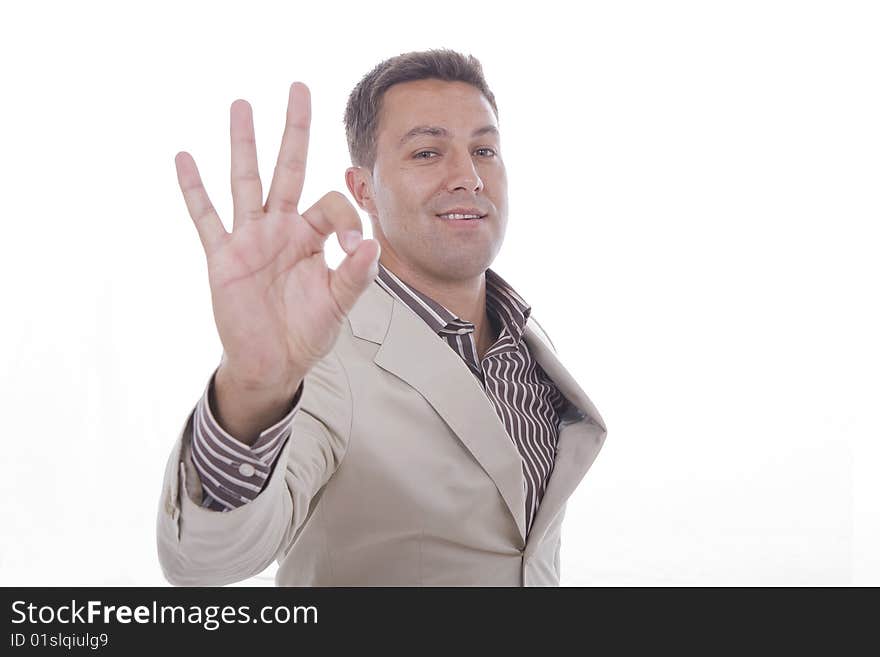 Businessman gesturing zero with hands on white