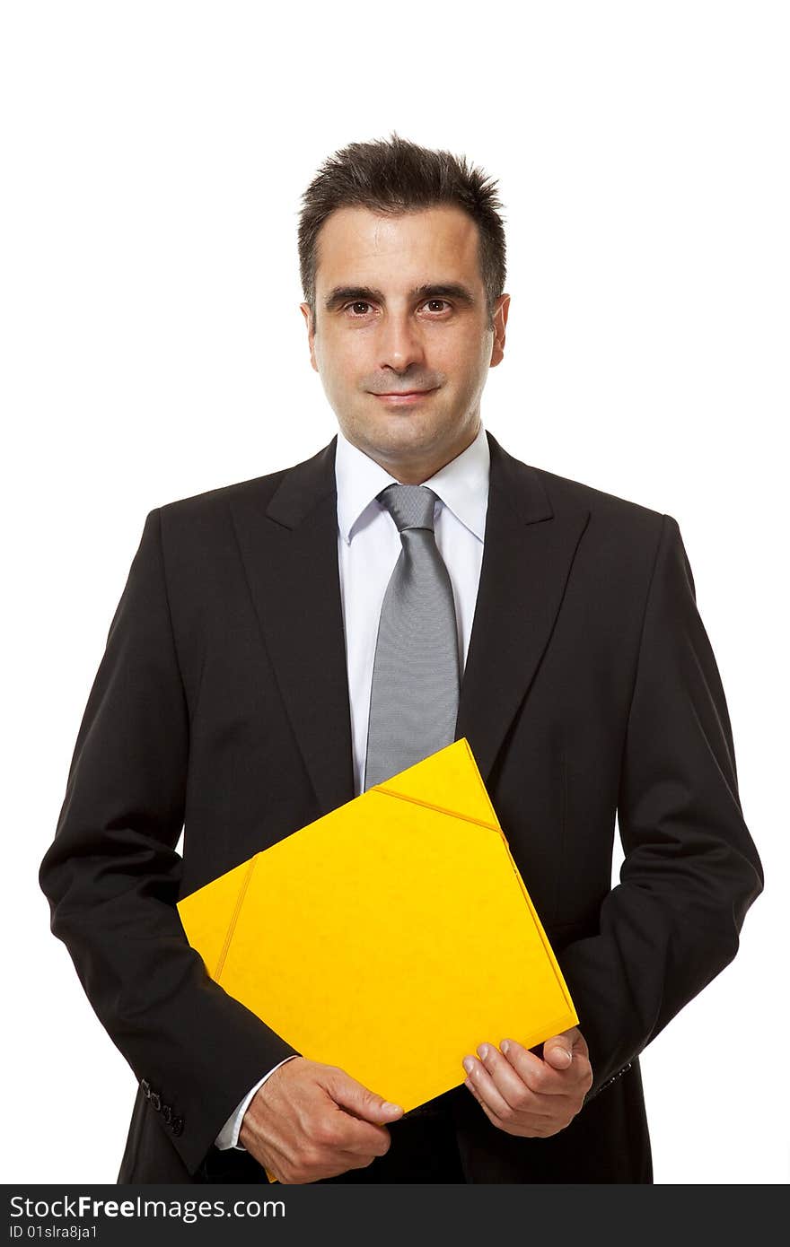 Businessman holds a yellow file from his office