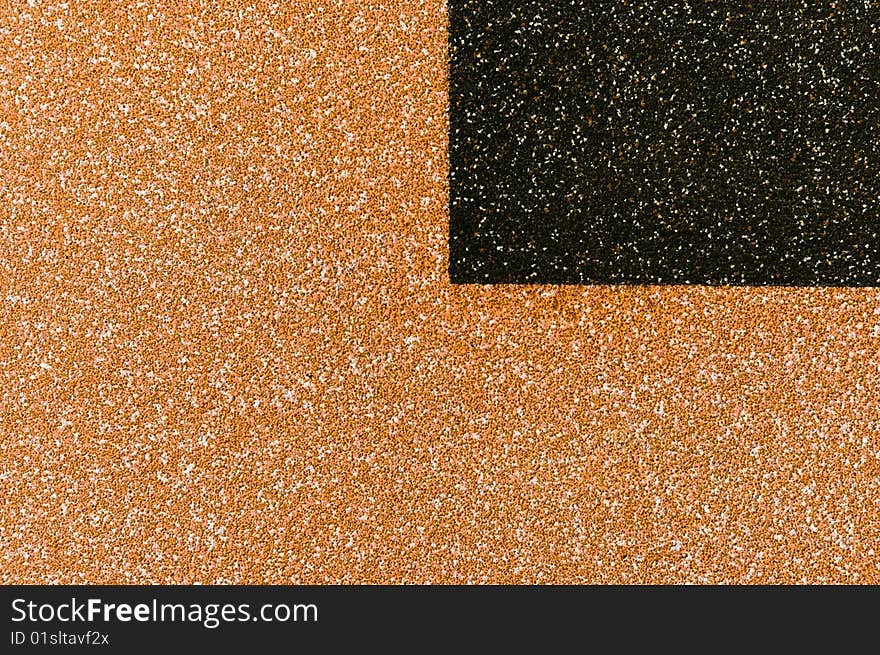 The texture from small white red and black stones with black quarter. The texture from small white red and black stones with black quarter