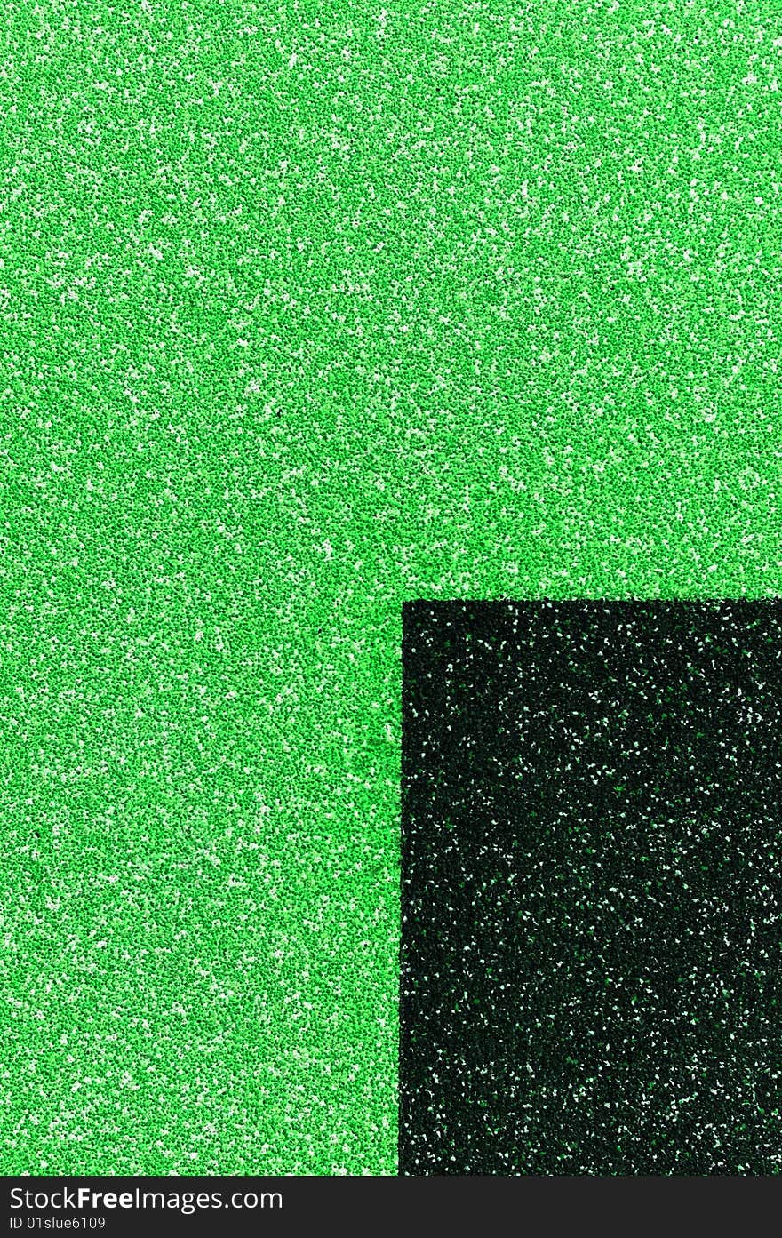 The green texture from small stones with black quarter. The green texture from small stones with black quarter