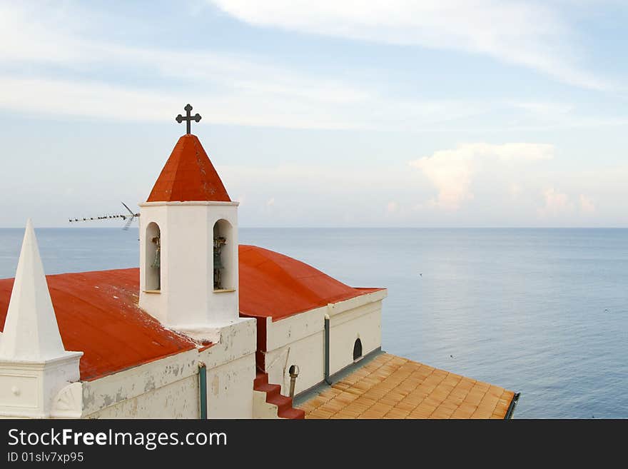 One of the famous churches at Capo Colonna on the italian region of Calabria. In the background is the mediterranean sea. One of the famous churches at Capo Colonna on the italian region of Calabria. In the background is the mediterranean sea.