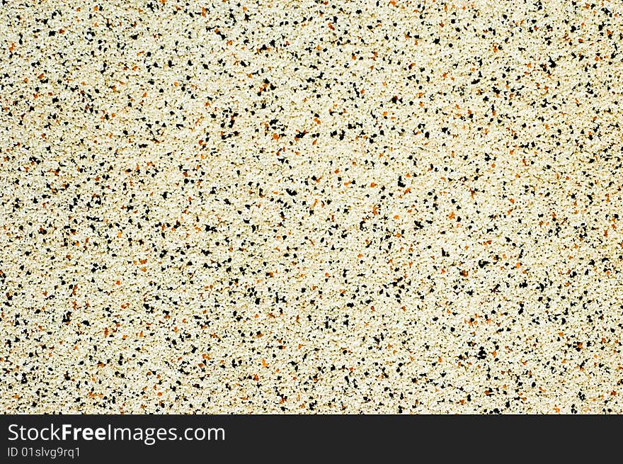 The white texture from small white yellow and blackstones. The white texture from small white yellow and blackstones