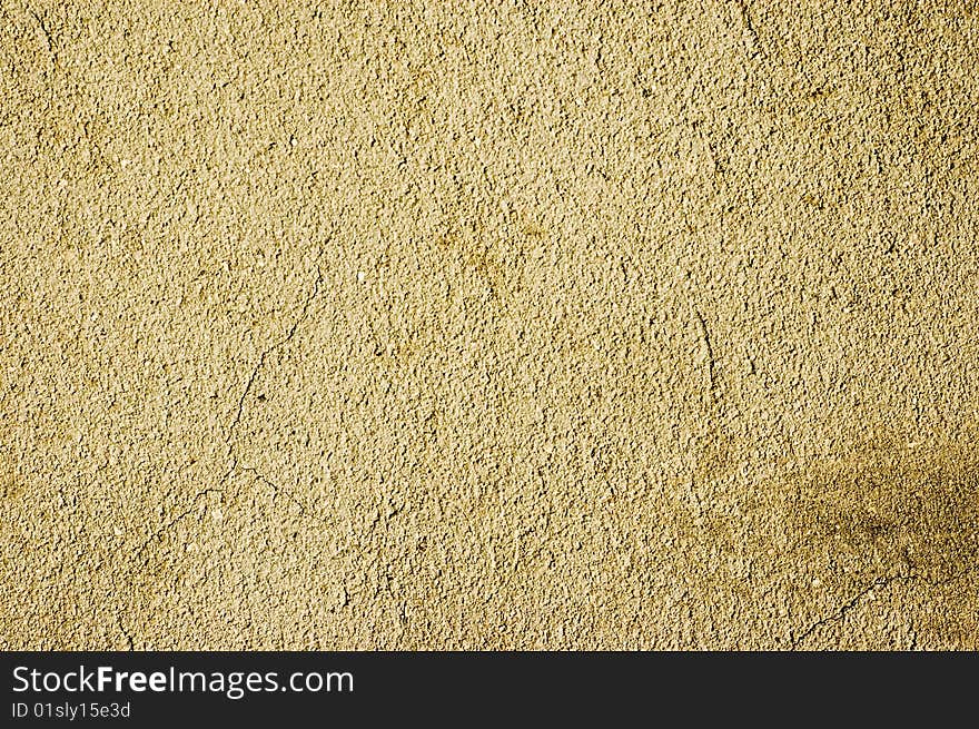 The wall covered with layer of a plaster with rifts. The wall covered with layer of a plaster with rifts