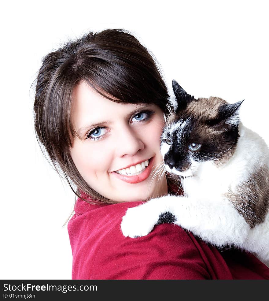 Woman holding cat in her arms; isolated