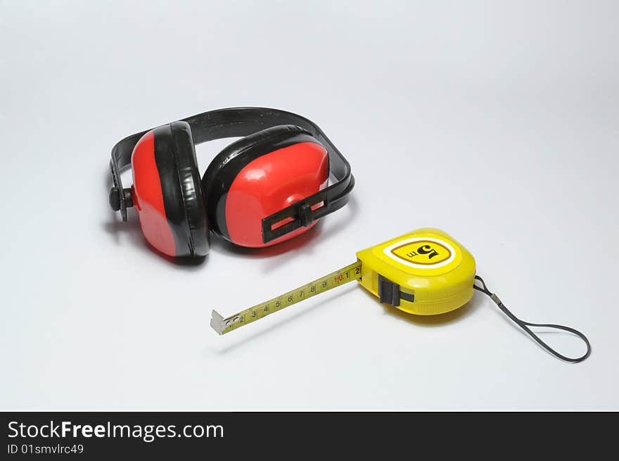 Ear protectors and tape measure. Ear protectors and tape measure.