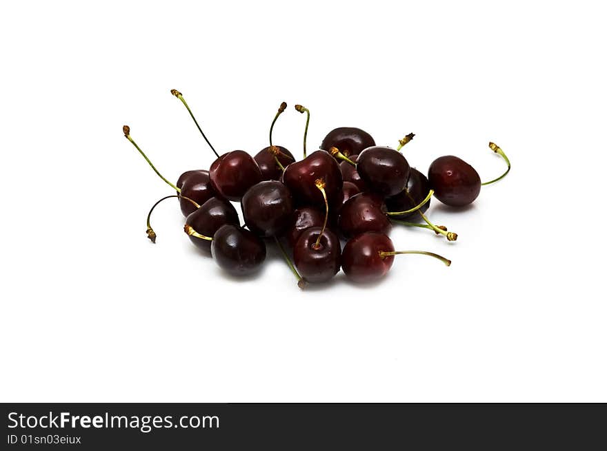 Fresh sweet cherries on white