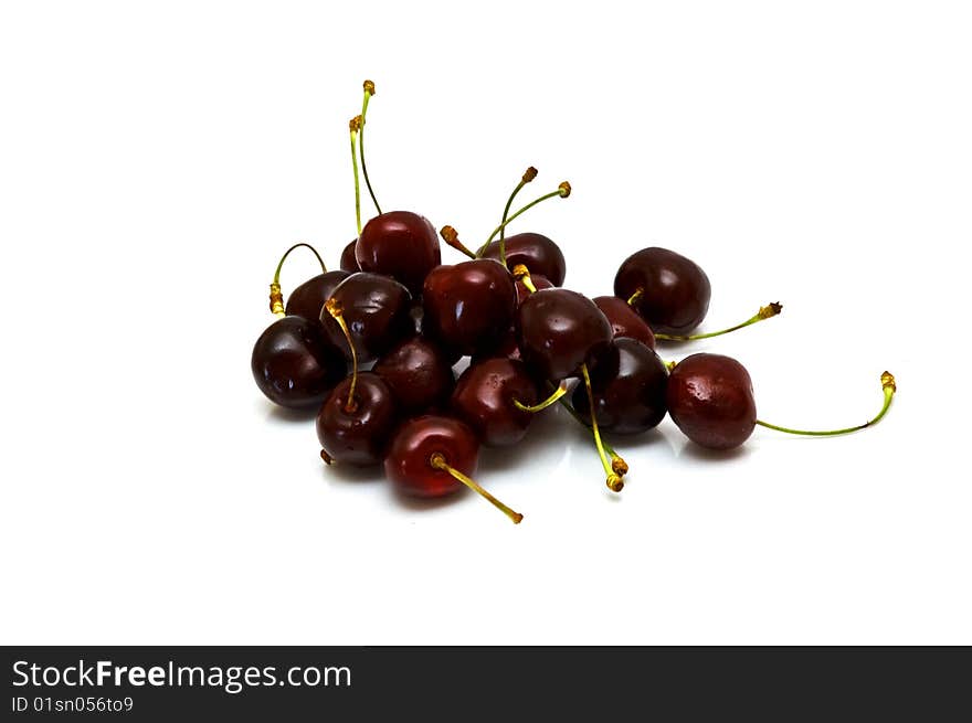 Fresh sweet cherries on white