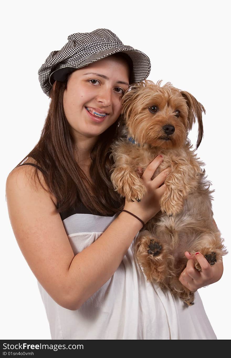 Cute teenage hispanic girl holding a pet yorkshire terrier dog. Cute teenage hispanic girl holding a pet yorkshire terrier dog