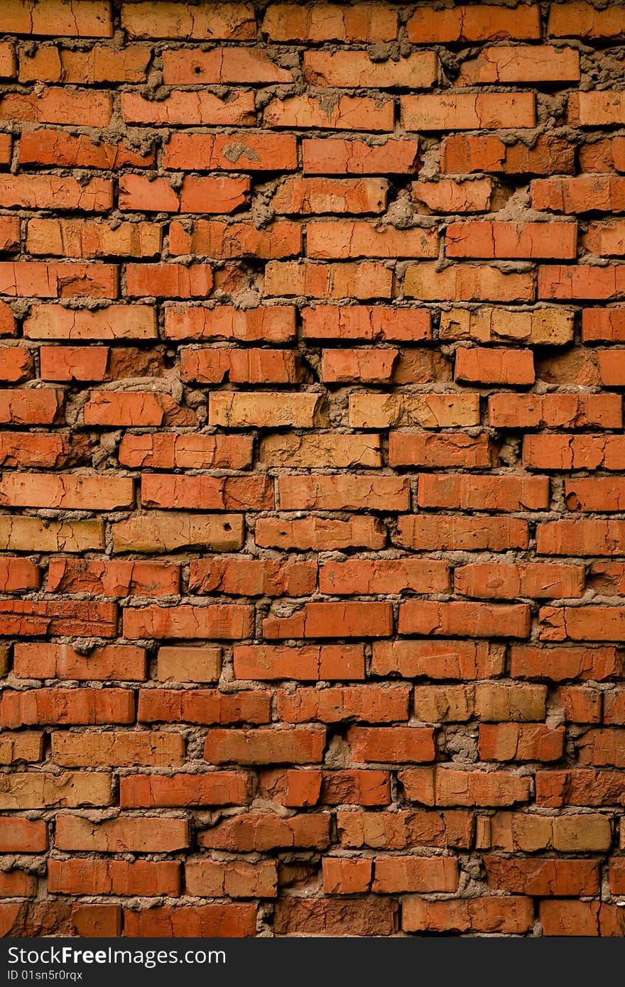 Grungy cracked old brick texture, natural light. Grungy cracked old brick texture, natural light