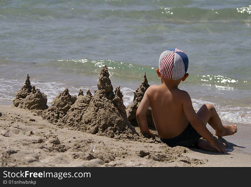 Sandy palace on the shore of the sea