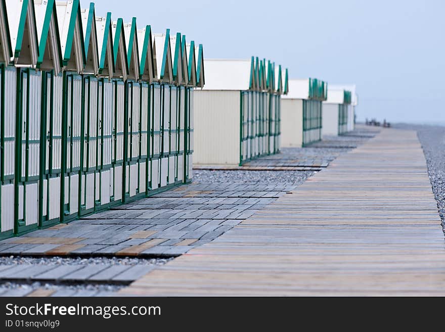 Row of beach huts before rain