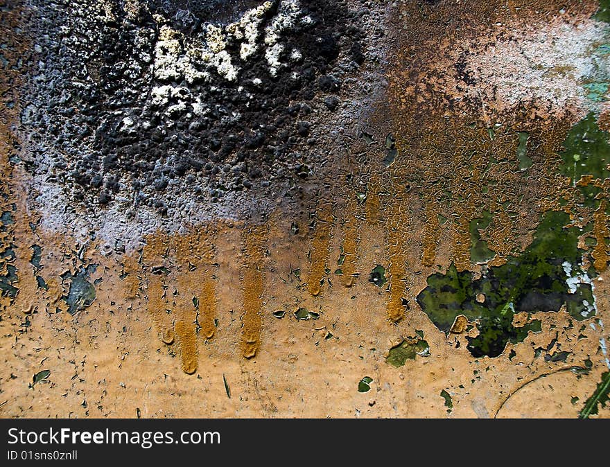 Abstract grunge background from weathered painted, stained, scratched and burned surface of metal. Abstract grunge background from weathered painted, stained, scratched and burned surface of metal