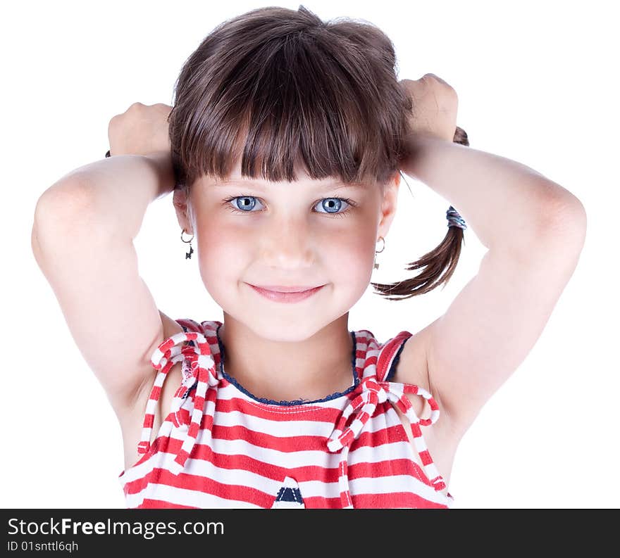 Little cute girl hold her pig tails, studio shot