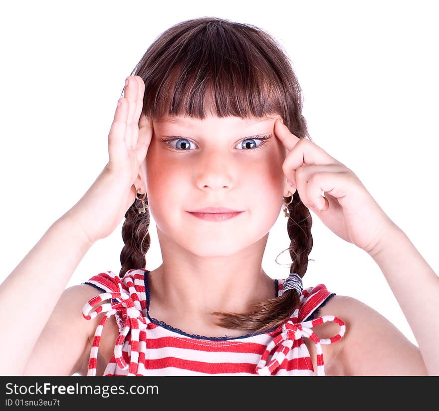 Cute little blue eyed girl making grimace, studio shot