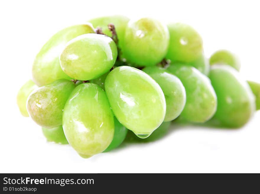 Fresh green grape isolated on white