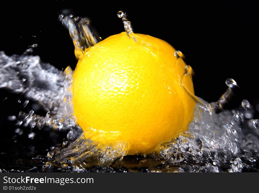 Fresh orange in water splash. Fresh orange in water splash