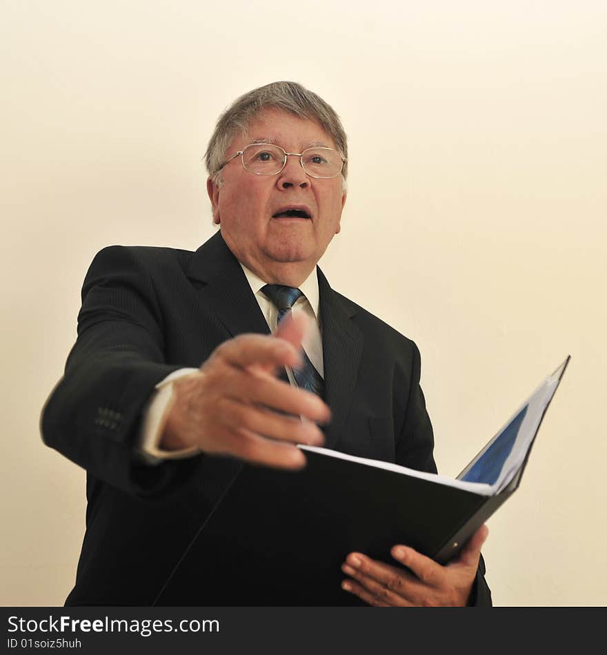 Businessman in suite and tie meeting client with file/folder in left hand, right hand extended for handshake, surprised look on face, all isolated on white background, space for print. Businessman in suite and tie meeting client with file/folder in left hand, right hand extended for handshake, surprised look on face, all isolated on white background, space for print.