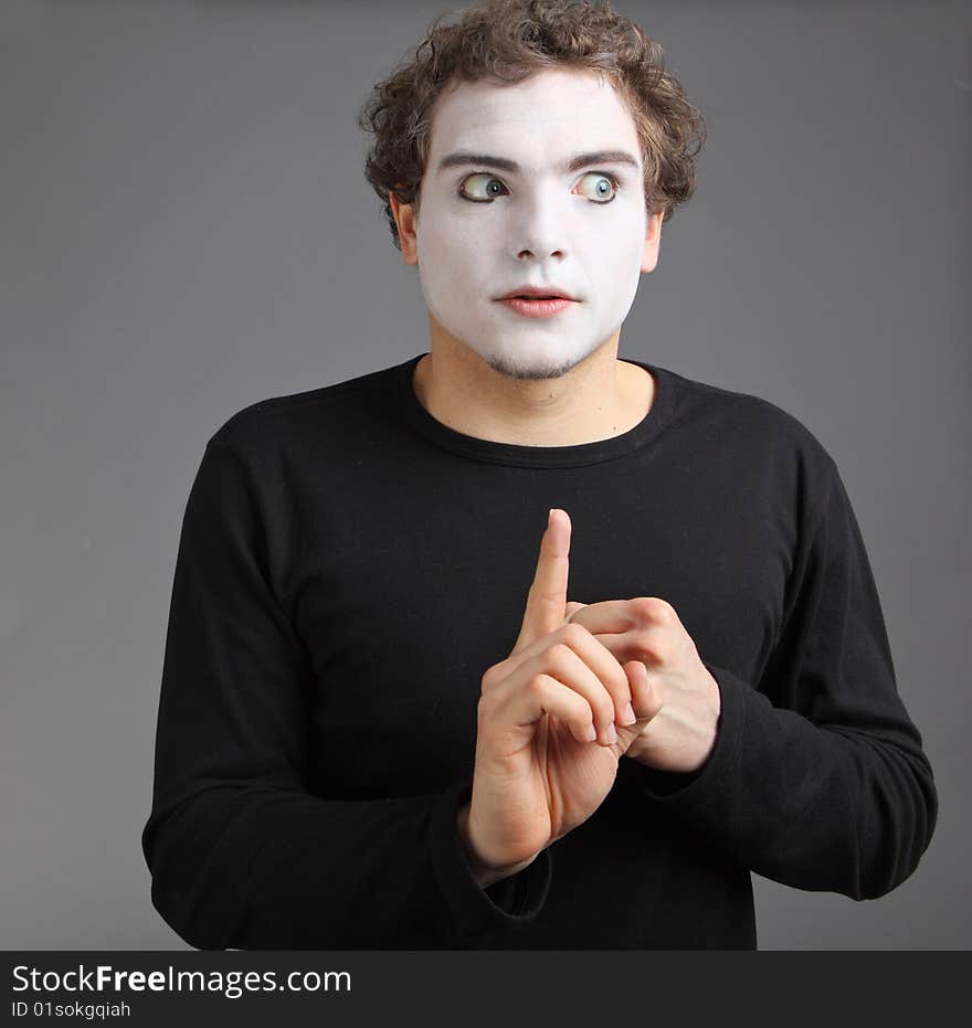 Portrait of the mime isolated on grey background