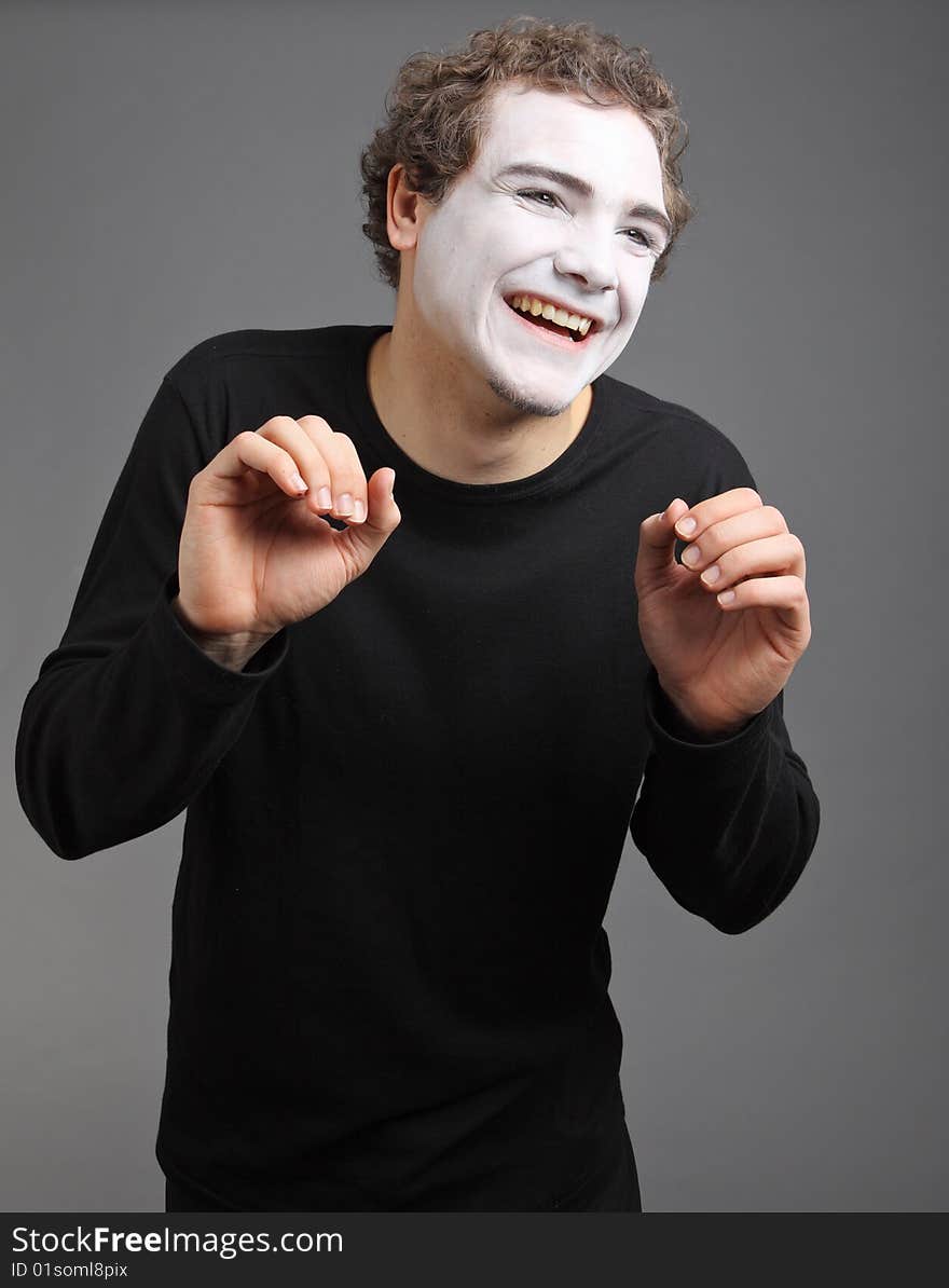 Portrait of the mime isolated on grey background